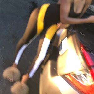 Body suit with yellow and white strips